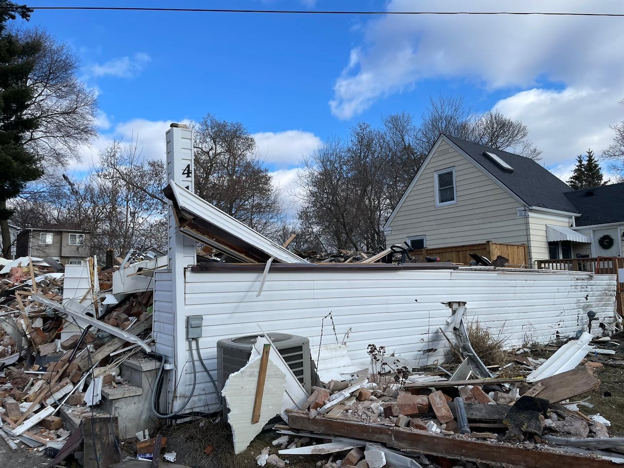 A severely destroyed house is pictured after a fire.