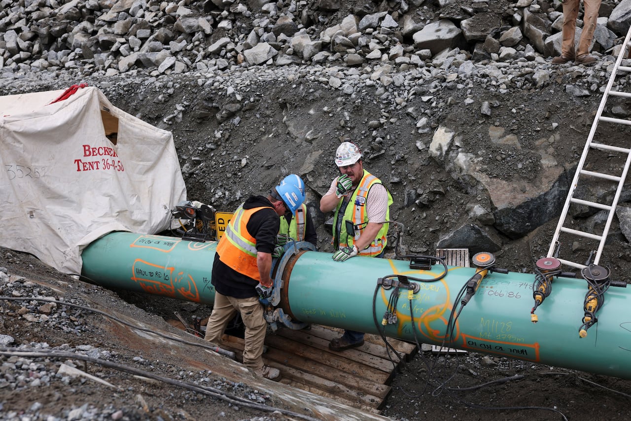 A pipeline is seen under construction.