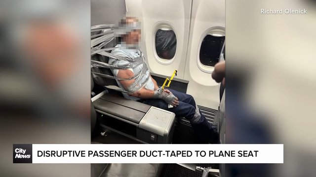 美航飞行中突发骚乱 乘客被胶带绑固定座椅后紧急迫降