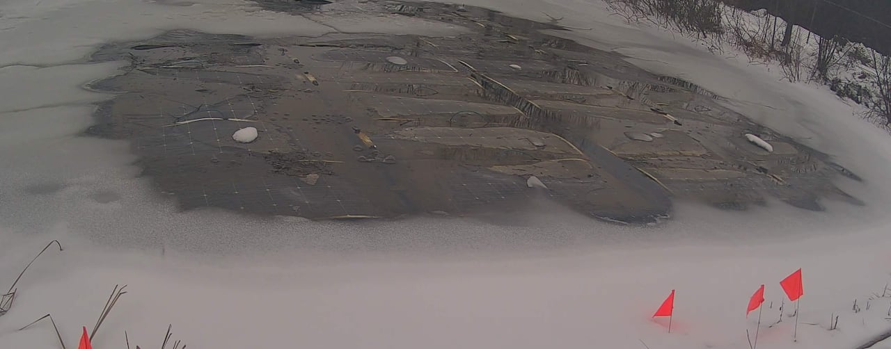Solar panels in a frozen pond