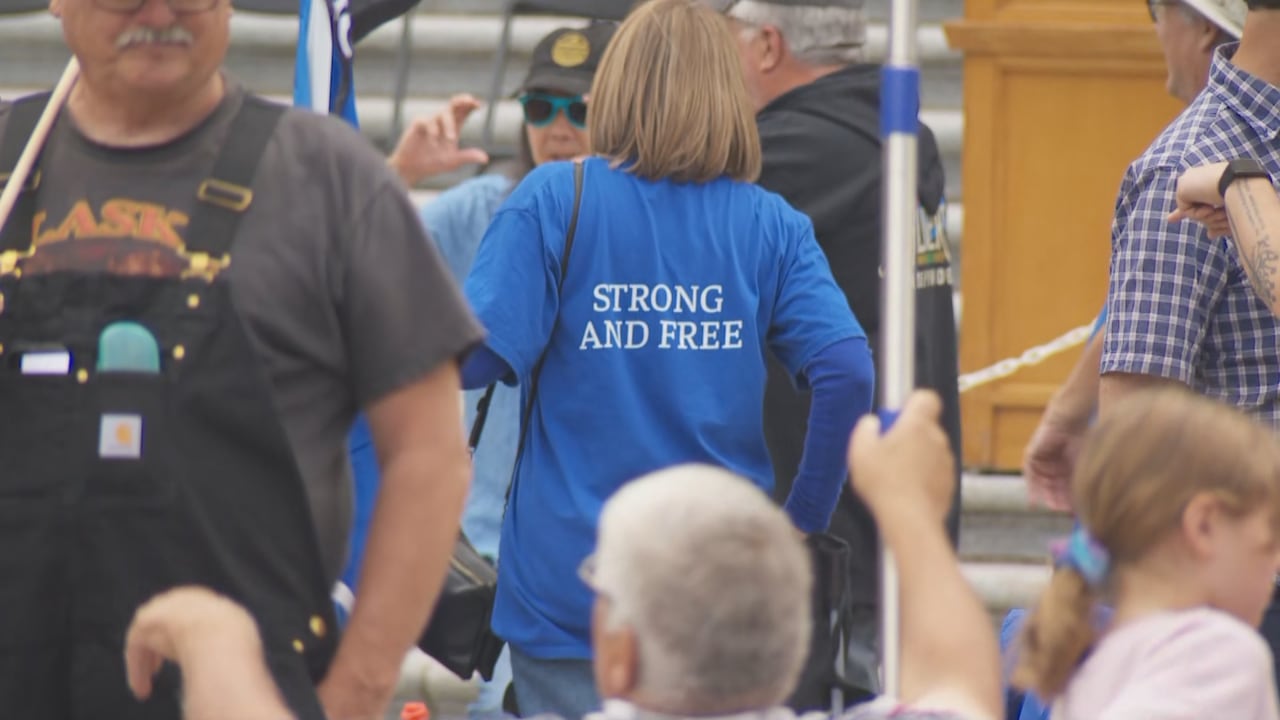 A person in a blue Strong and Free t-shirt is seen Saturday, Aug. 29 at a pro-separation rally at the Alberta Legislature in Edmonton.