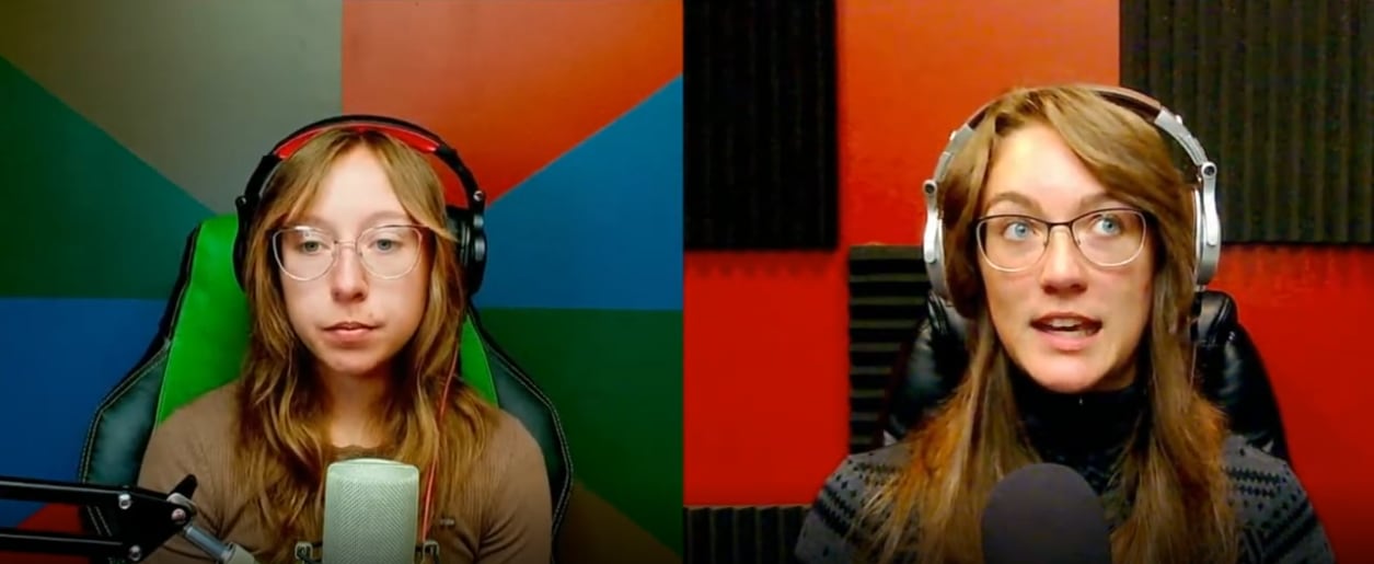 Two young women sit in front of colourful, geometric backgrounds, speaking into microphones and wearing headphones.