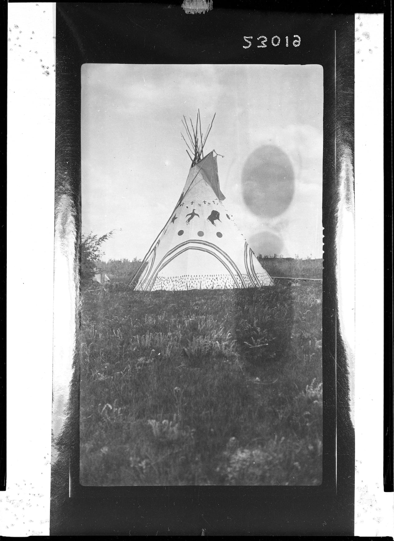 A black and white photo of the tipi on the Smithsonian website catalog.