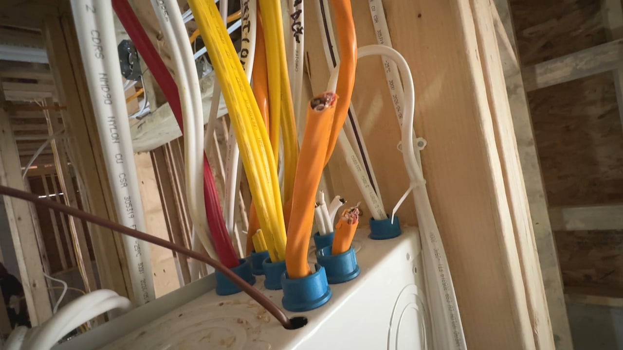 Damaged electrical cables in a home construction site.