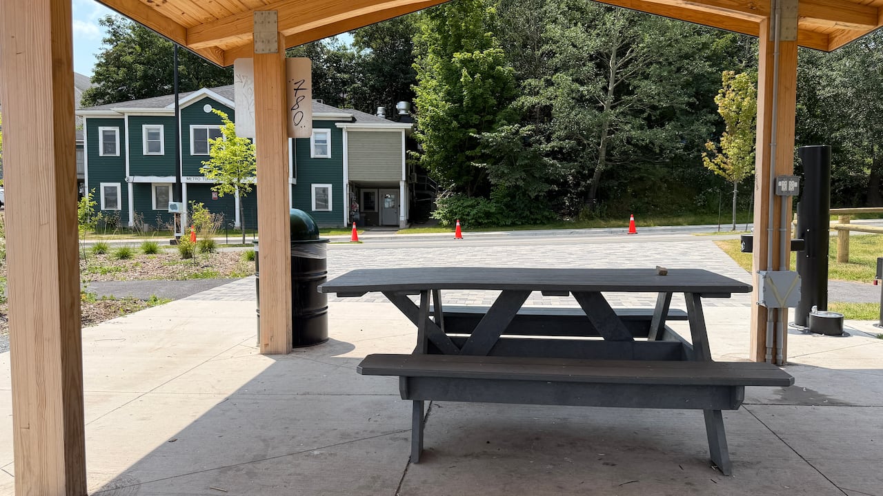 A picnic bench in Amalamek Way park across from Metro Turning Point shelter.
