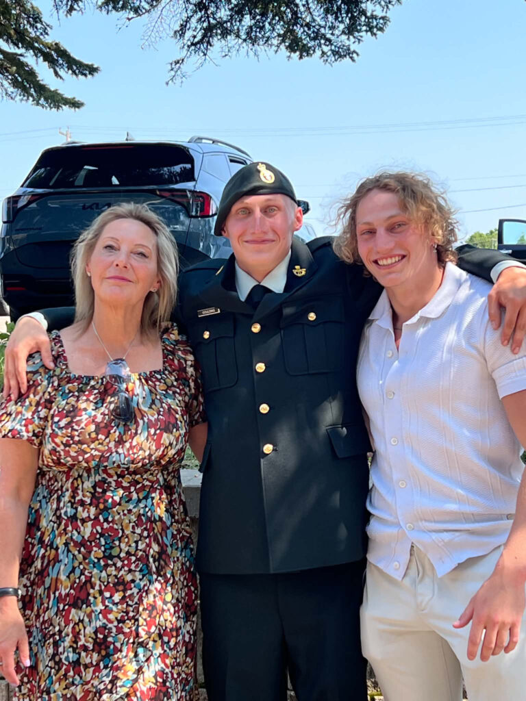 Aidan Goulding, 23, is shown in an undated handout photo alongside his mother Sonia Monk and brother Wylder Goulding. Goulding was one of four Canadian Armed Forces members who was killed in an out of control grass fire during a training exercise at CFB Wainwright Saturday night