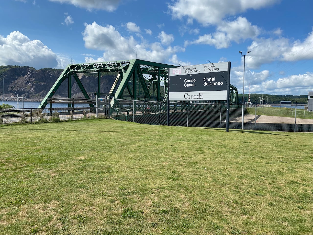 Swing bridge with large official "Canso Canal" signage