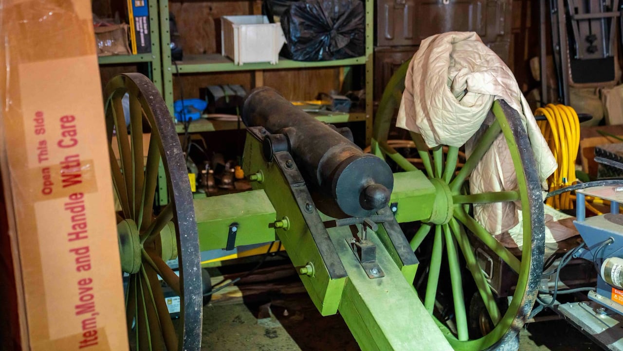 A cannon is shown inside of a home.