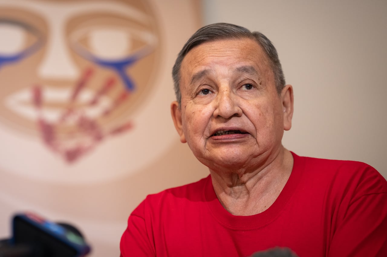 An image of a man in a red shirt.