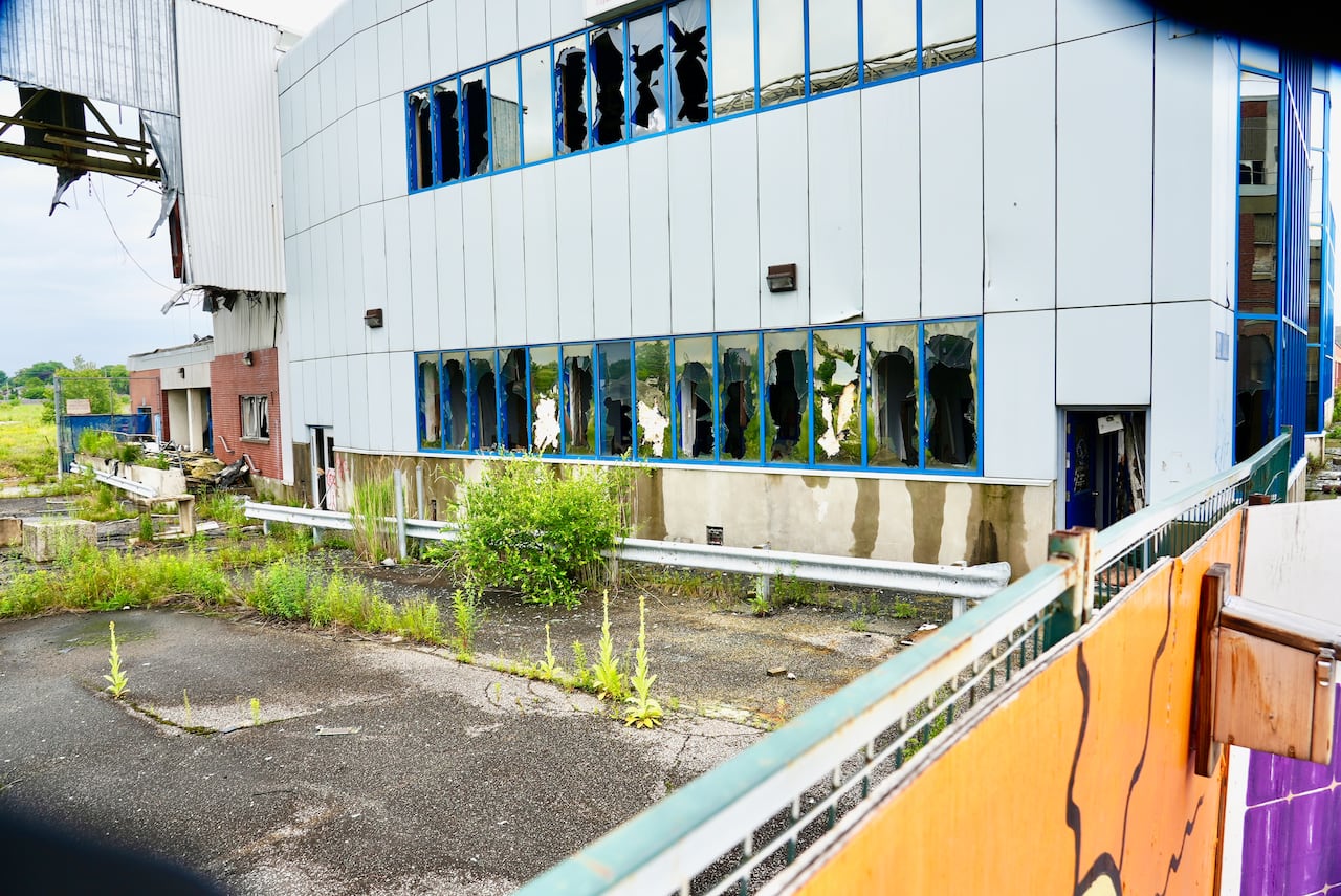 A deteriorating building is seen.