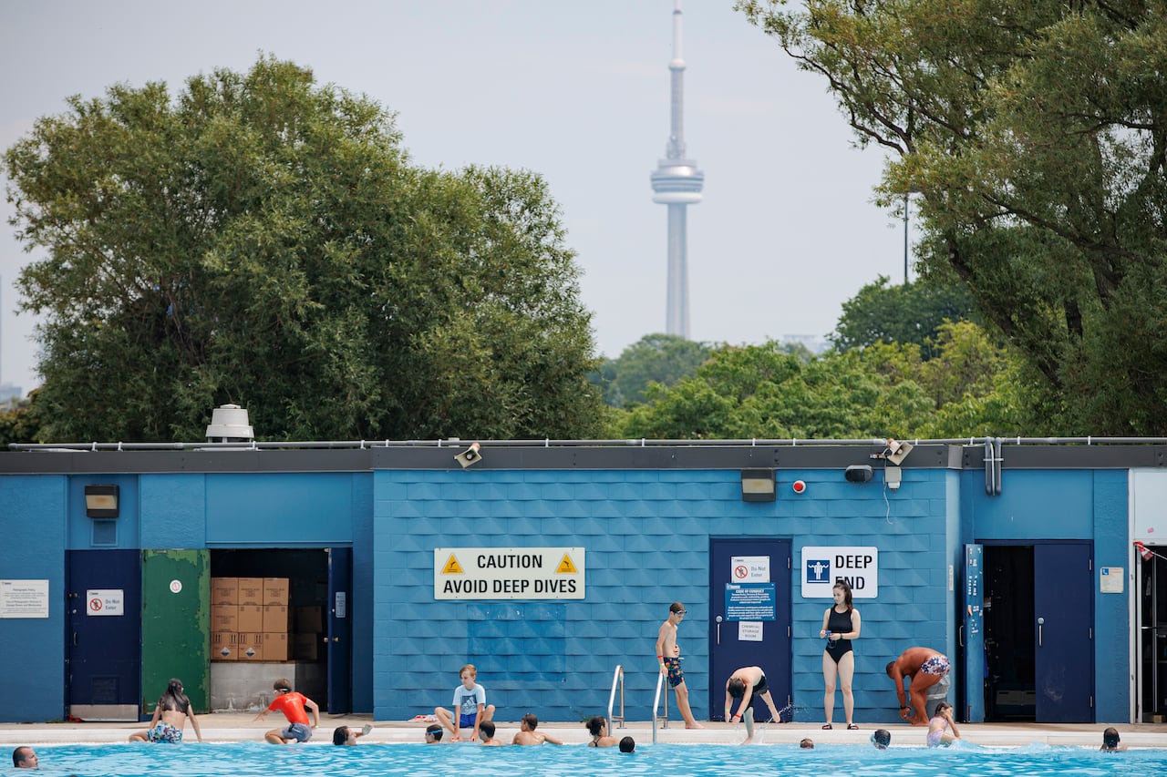Bathers swim at Sunnyside Gus Ryder Outdoor Pool, on Toronto’s lakeshore, during a heatwave on July 20, 2022.