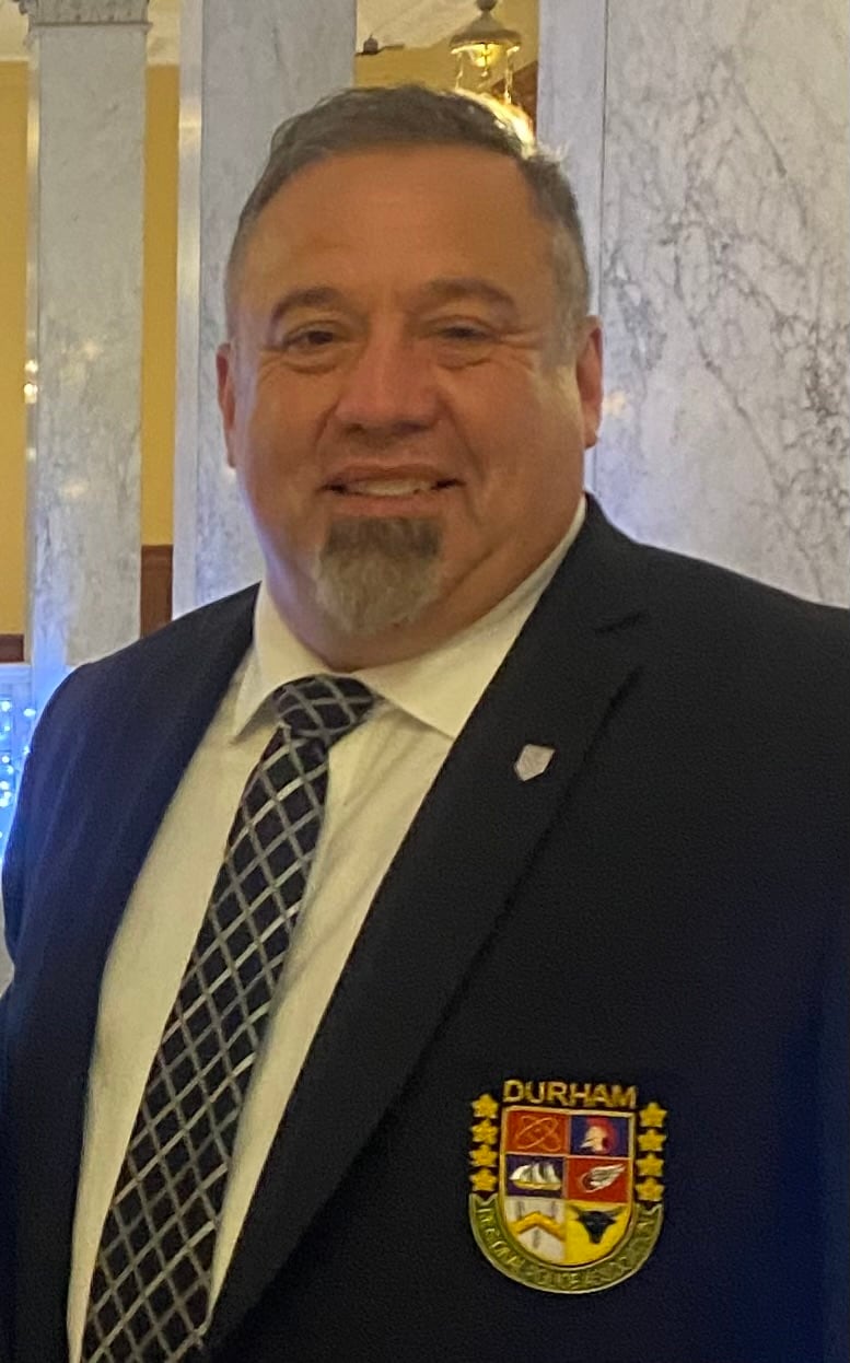 Photo of a man in a suit