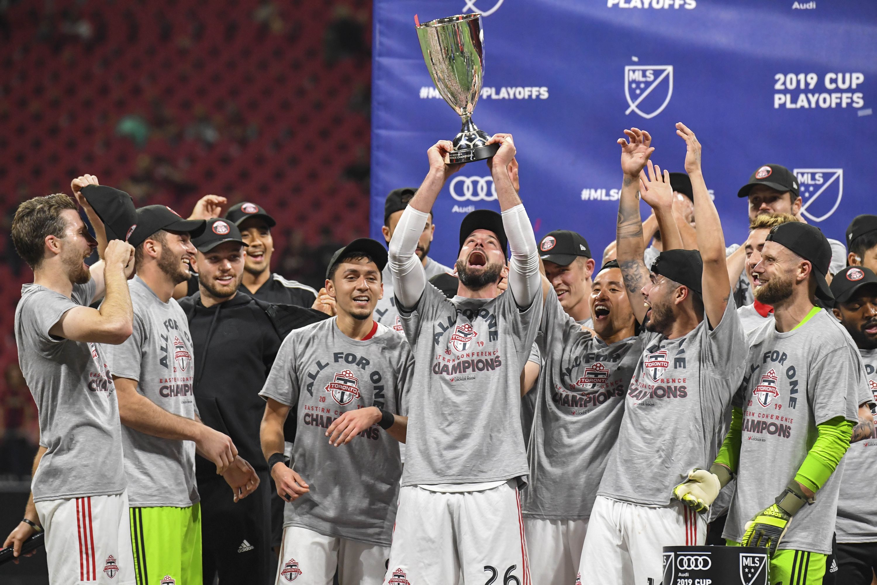 Toronto FC celebrates with the trophy after beating Atlanta United at Mercedes-Benz Stadium last week. (USA TODAY SPORTS)