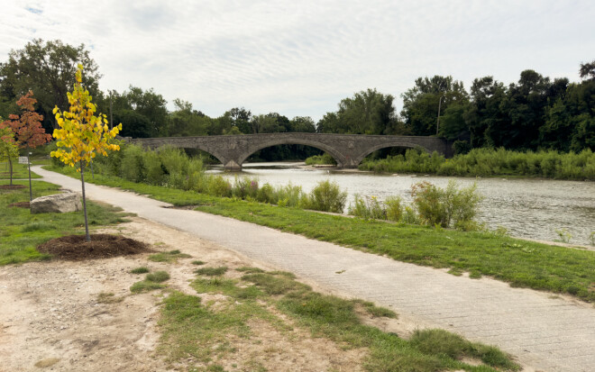 Trail along Humber River flowing through Etienne Brule Park.