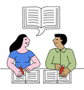 two students discussing their writing