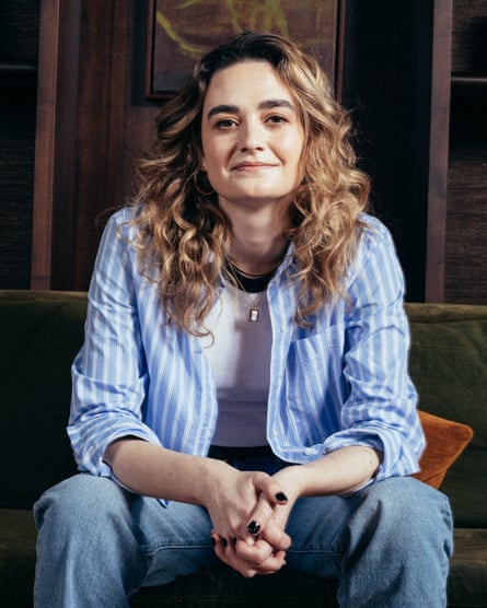 a photo of a woman with curly hair