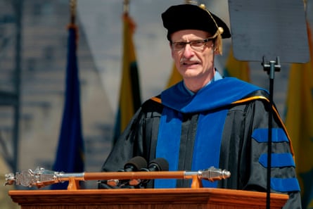 a man speaks into a microphone