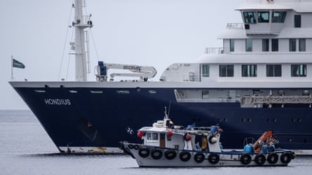 MV Hondius and a smaller boat