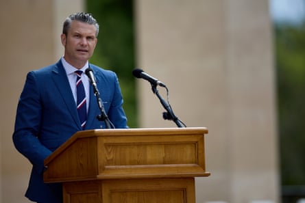 a man in front of a microphone 