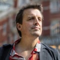 Headshot of journalist Oliver Bullough