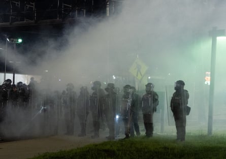 Protesters clash with New Jersey state police outside the Delaney Hall immigration detention center late Saturday in Newark, New Jersey.