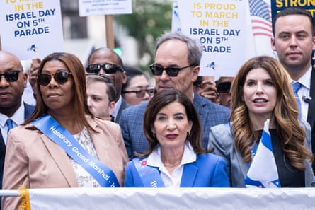 people walk in a parade