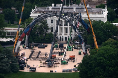 An aerial view shows large metal arches being installed on the White House South Lawn